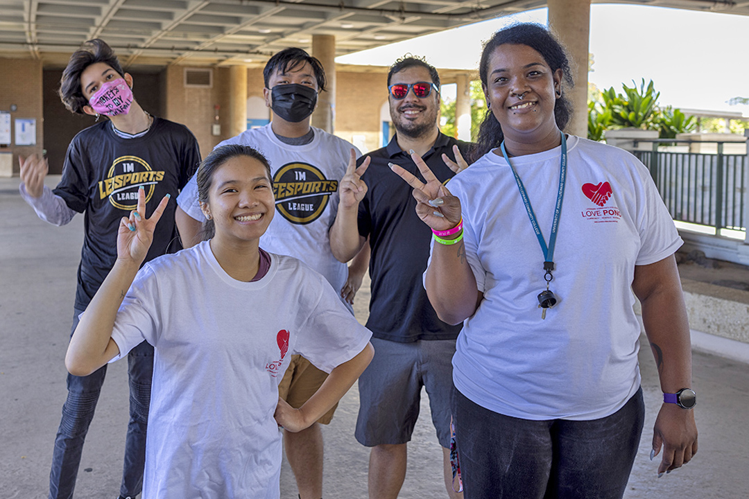 Small group of student workers at Welcome event on concourse